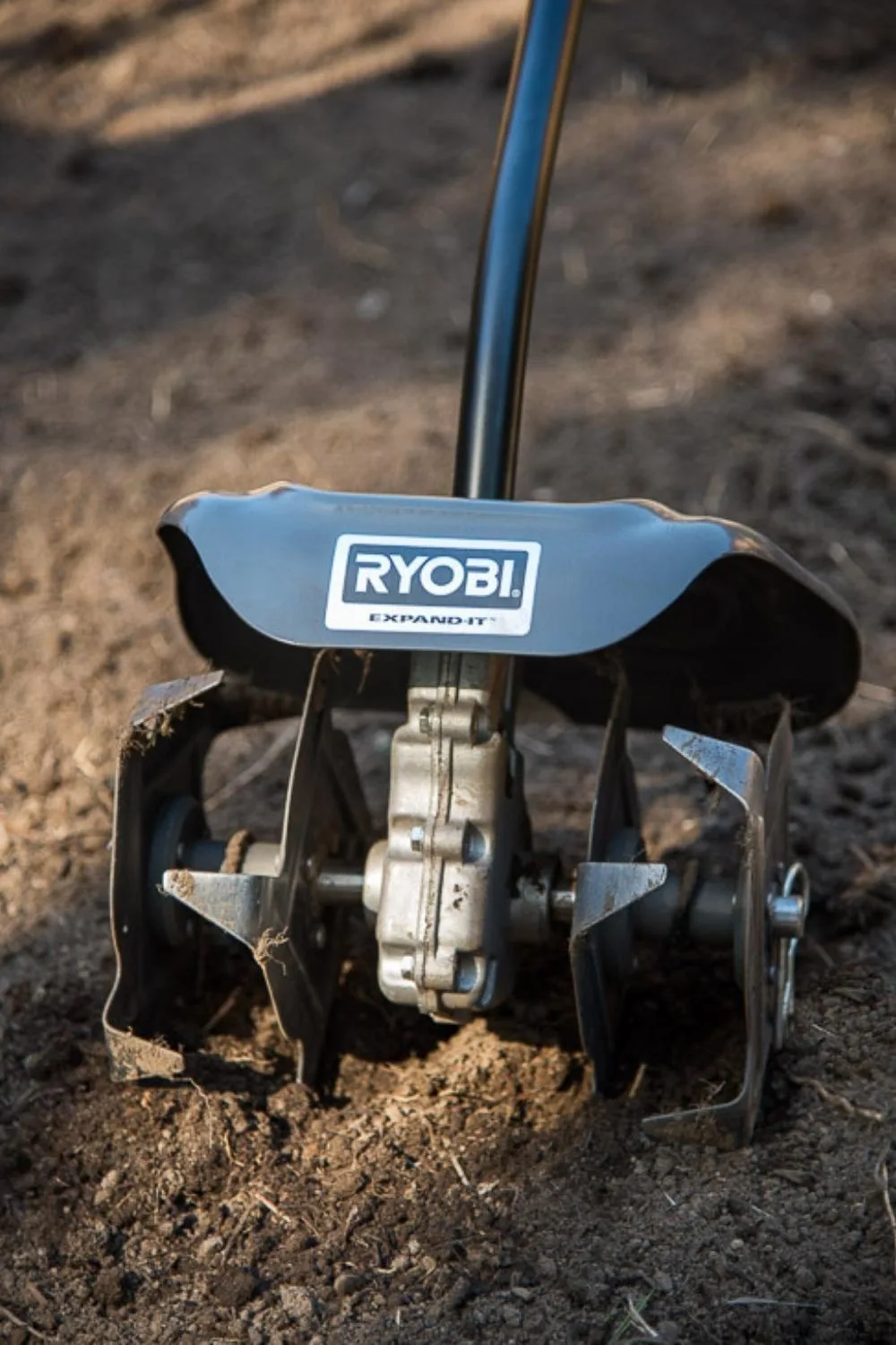 cultivator attachment for clearing weed roots from overgrown garden