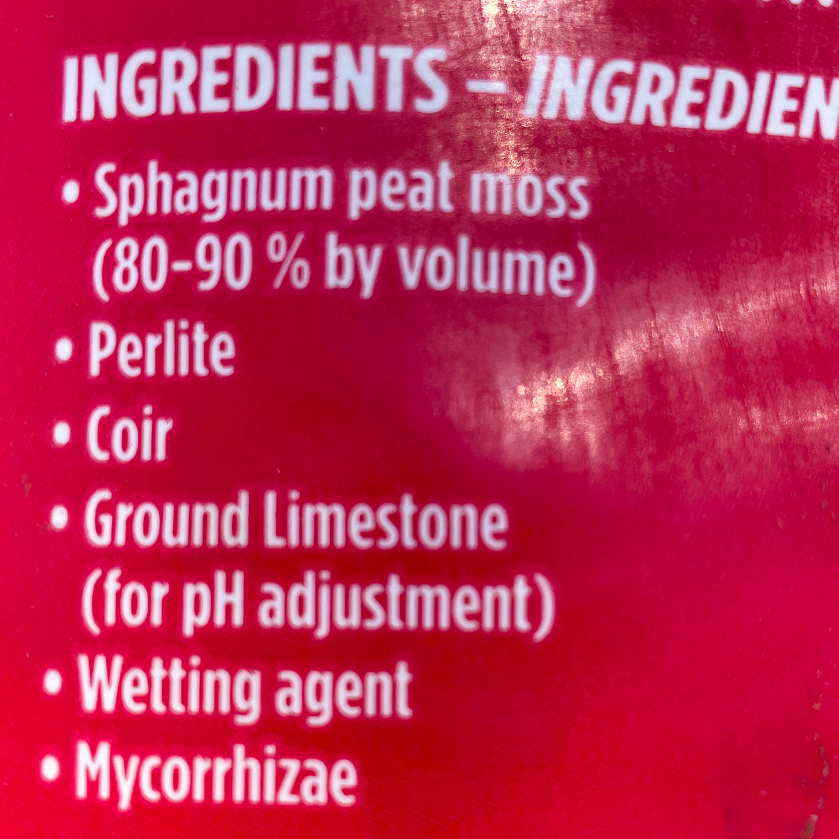 list of ingredients on the back of a well-draining potting soil bag